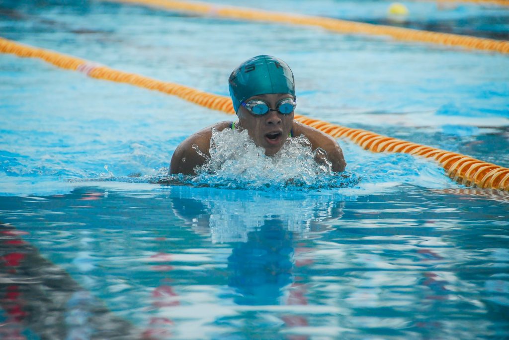 A swimmer swimming at the Miller swimming pool A swimmer at the Miller swimming pool