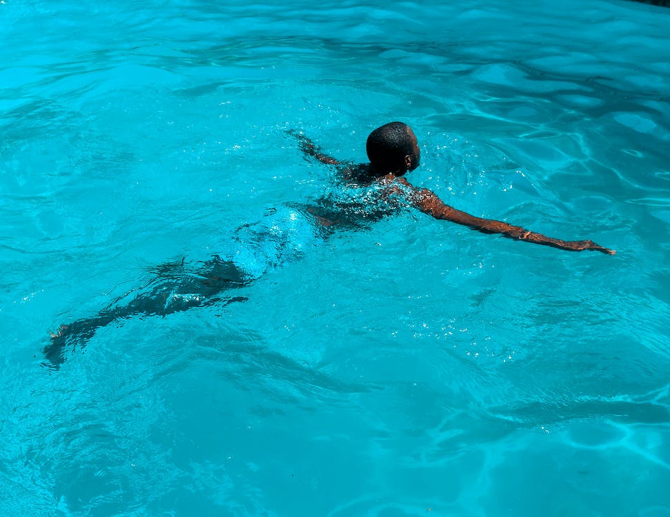 male swimmer in the swimming outline position