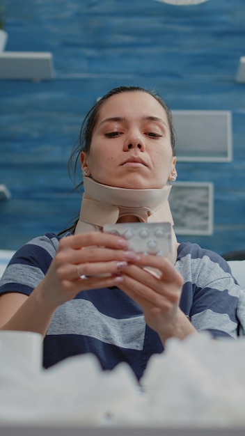 a female treating her neck after being a victim of swimming neck pain