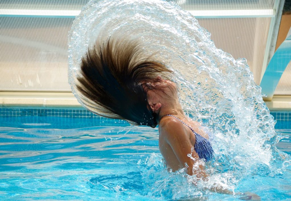 female swimmer doing flip turn in the swimming pool