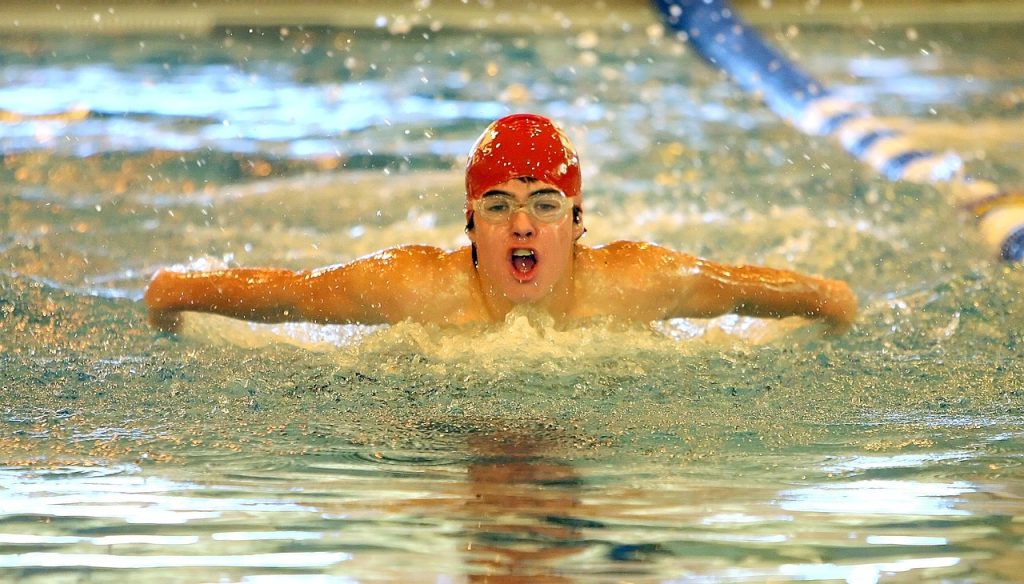 A Male swimmer experienced the swimmer's high in the pool
